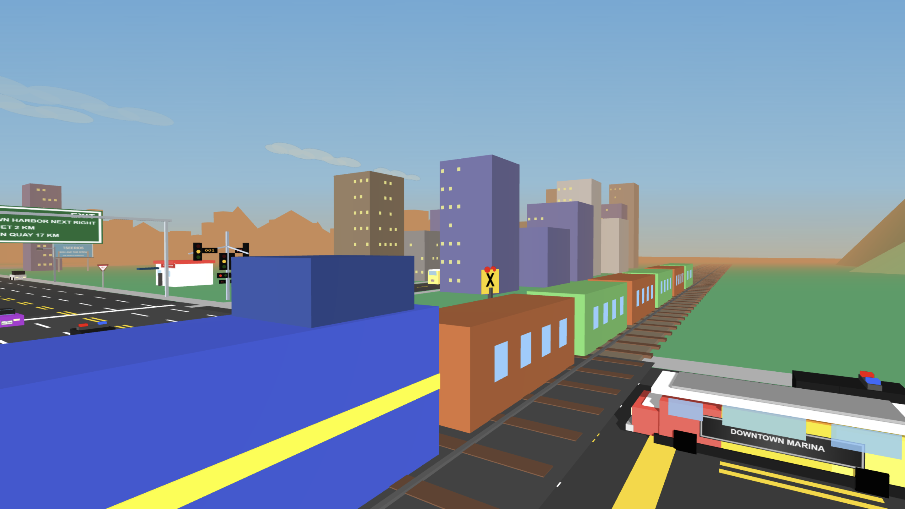 A long train crossing through San Andreas beside a transit station at dusk